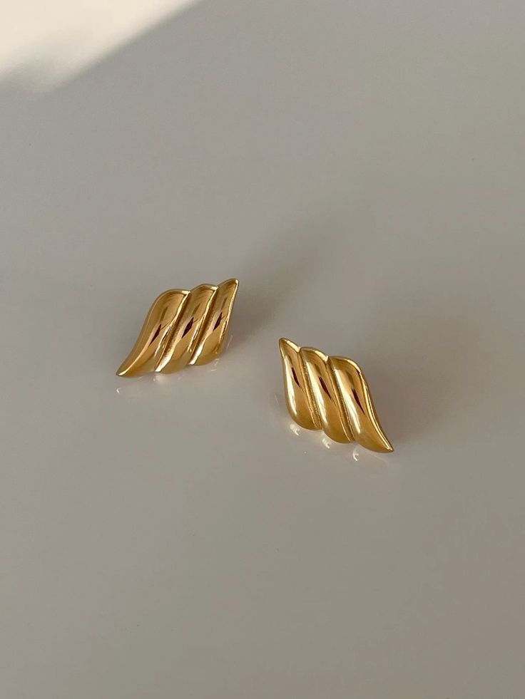 angel statement earrings